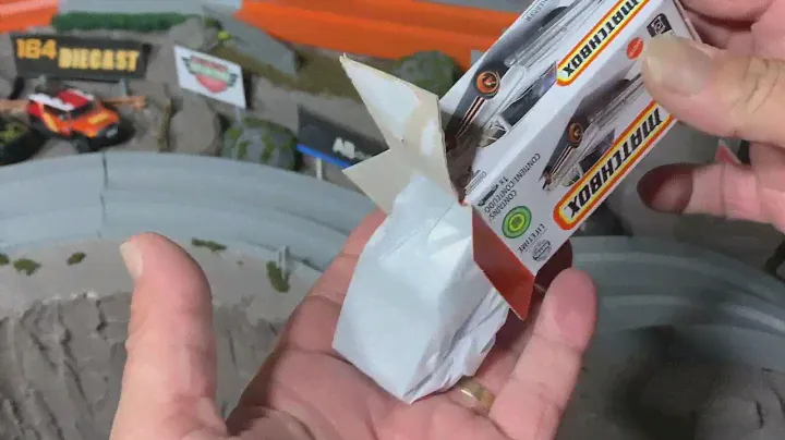 unboxing 1966 Dodge Charger Matchbox - just paper, cardboard and me knocking 3Dbotmaker's sign over